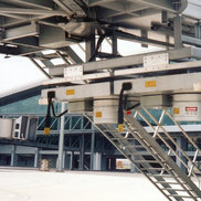 A Conductix-Wampfler Motor-Driven Cable Reel mounted on a passenger Loading Bridge.